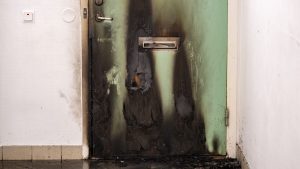 En person gripen efter mordbrand mot familj med barn i Helsingborg