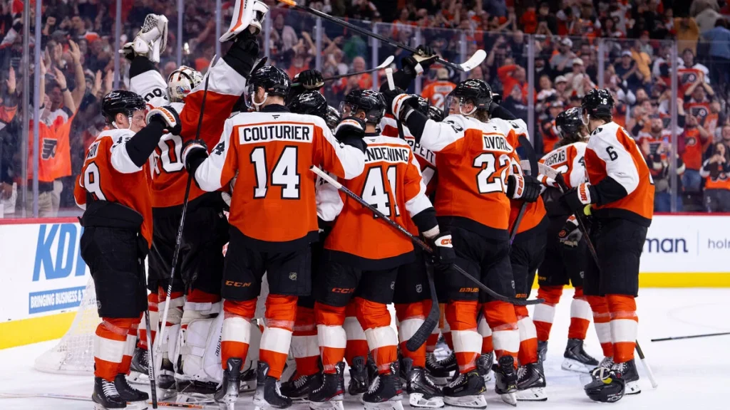 Här är titeln översatt till svenska:
”Philadelphia redo för NHL-slutspel efter straffläggningsseger mot Carolina”