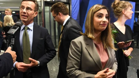 Kristersson och Dadgostar i konflikt om Vänsterpartiets kandidater