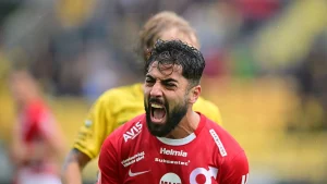 Here are a few natural ways to rewrite the title in Swedish, depending on the tone you want:
Option 1 (Punchy sports headline):
”Degerfors tung kväll – busshaveri och tidigt självmål bakom 2-0-förlusten mot Sirius”
Option 2 (Closer to the original structure):
”Degerfors tvingades genomlida en tuff kväll när busshaveri och ett tidigt självmål ledde till 2-0-förlust borta mot Sirius”
Option 3 (Slightly more conversational):
”Tung kväll för Degerfors: trasig buss och tidigt självmål i 2-0-förlust mot Sirius”
Option 4 (Very concise):
”Busshaveri och tidigt självmål sänkte Degerfors – 2-0-förlust mot Sirius”
All of these are grammatically correct and natural for Swedish sports journalism. Let me know if you want a specific regional variation or a more tabloid-style headline!